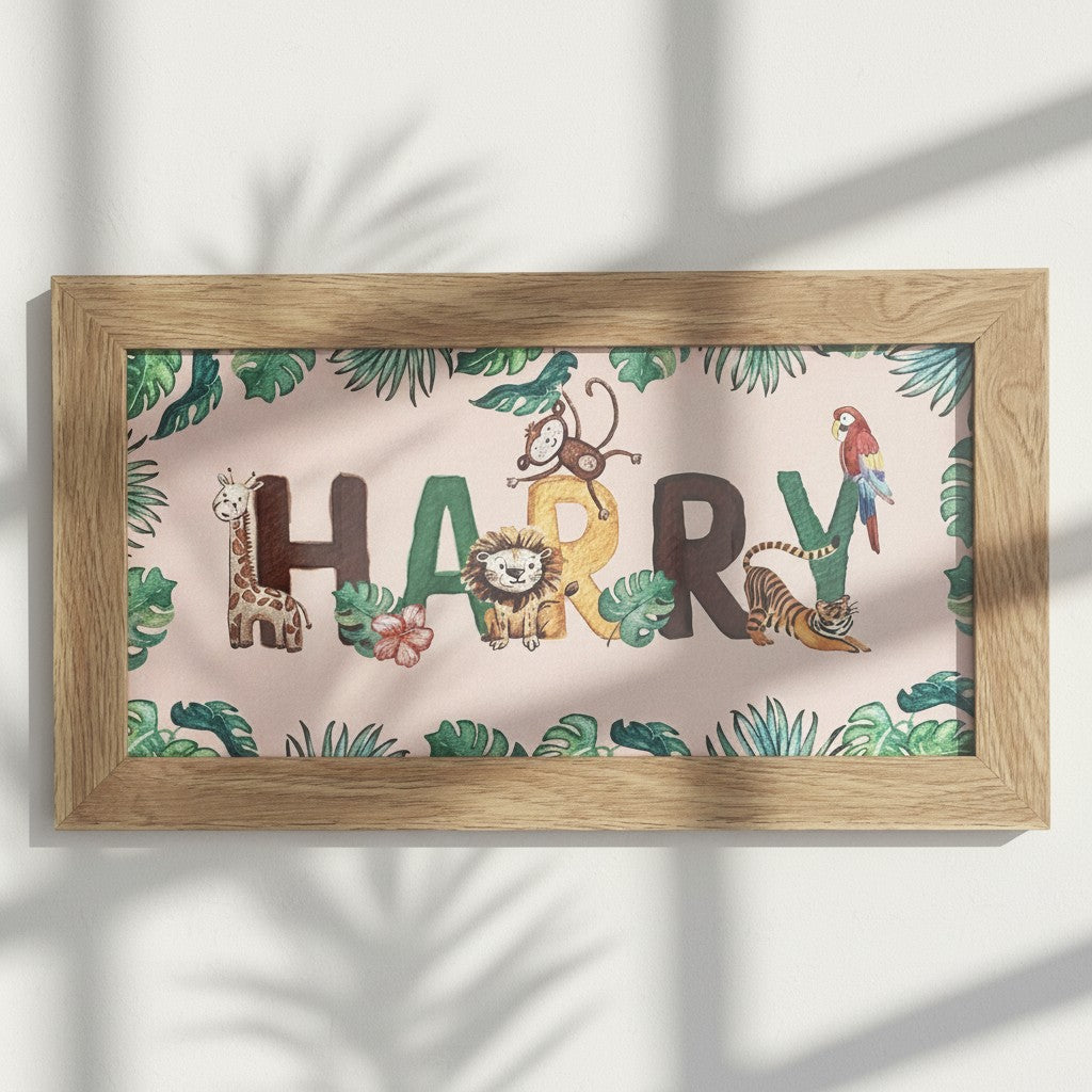 School Bus Studio custom safari name print in an oak frame with watercolor jungle animals on pink background.