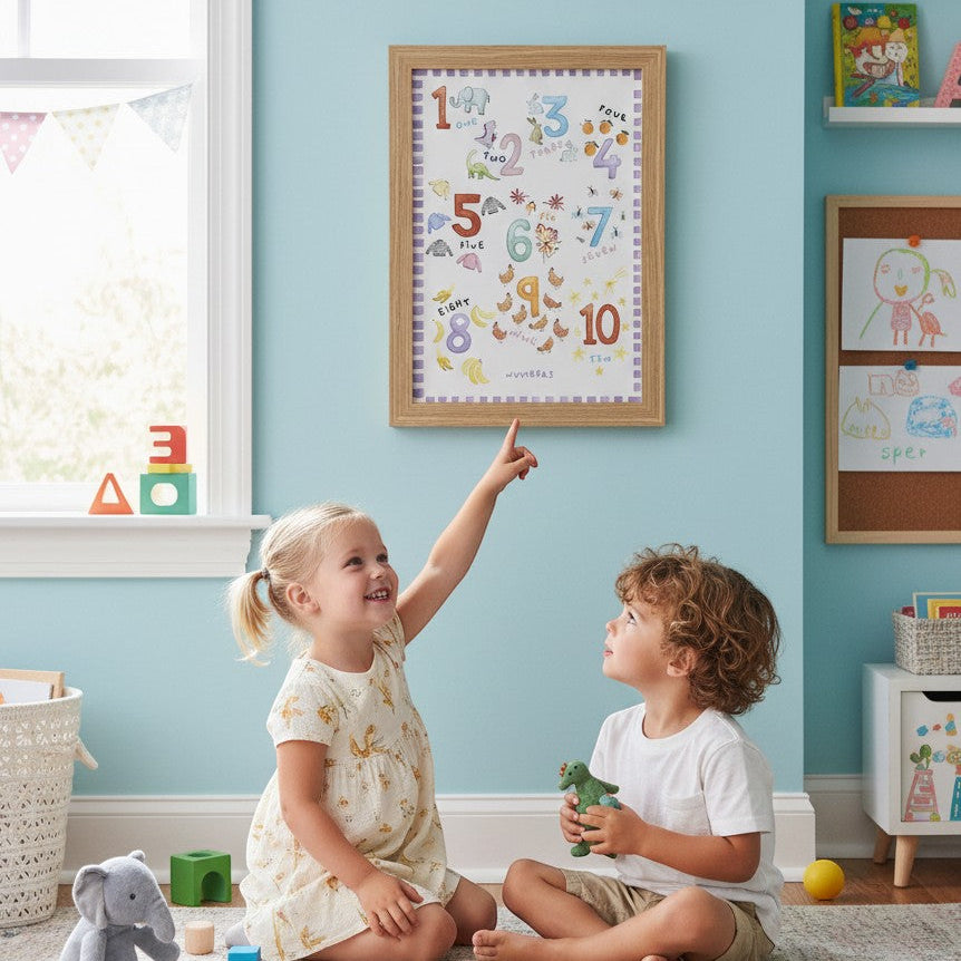 School Bus Studio A3 numbers print in oak frame hanging in a colorful nursery with two children playing on the floor.